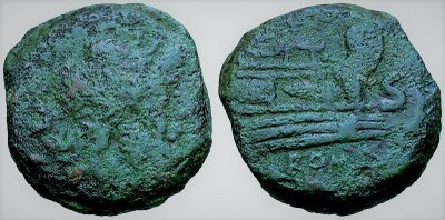 Antica moneta romana con la sagoma di una prua